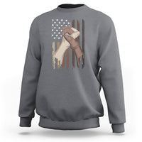 Dark heather gray sweatshirt with US flag and hands graphic, crewneck long sleeves