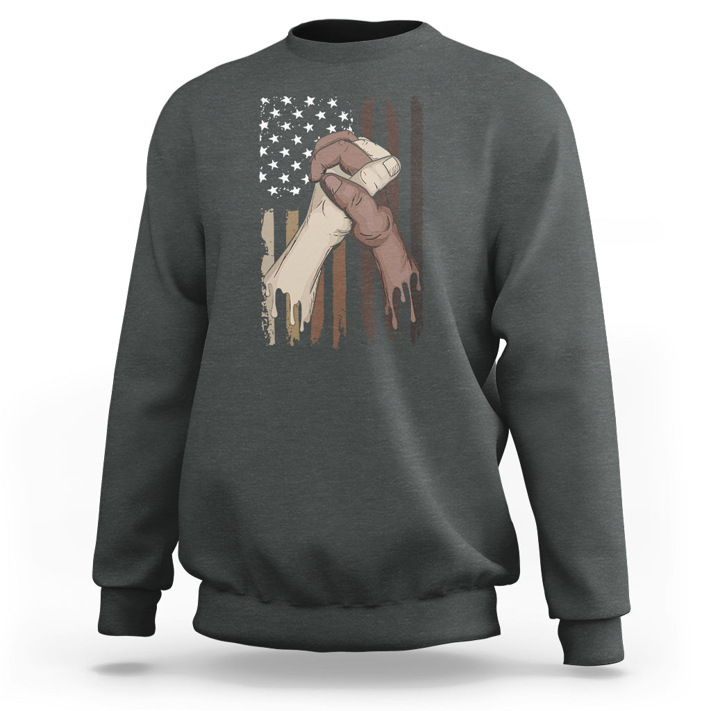 Charcoal gray sweatshirt with US flag and hands graphic, crewneck long sleeves