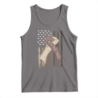 Gray graphic tank top with raised hands and small US flag stars.