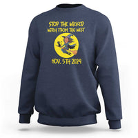 Navy Halloween sweatshirt with witch graphic and “Stop the Wicked From The West” text
