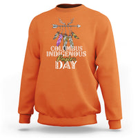 Orange crewneck sweatshirt with colorful feathered deer graphic and event text print