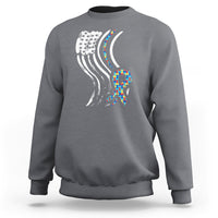 Charcoal gray sweatshirt with autism awareness ribbon graphic and American flag stripes on back