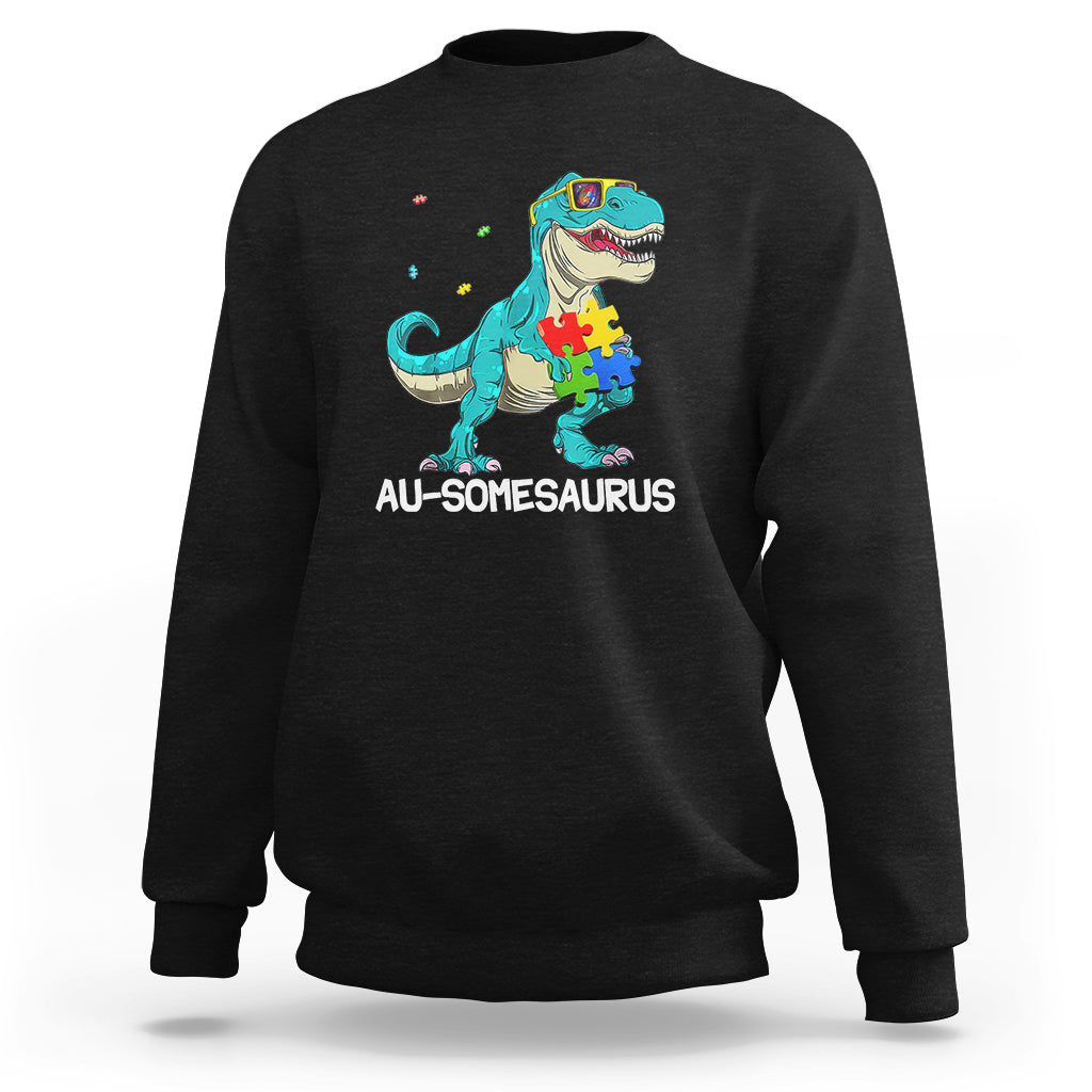 Dinosaur autism sweatshirt, black, turquoise dino puzzle graphic with AU-somesaurus text