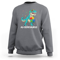 Dinosaur autism sweatshirt, charcoal gray, turquoise dino puzzle graphic with AU-somesaurus text