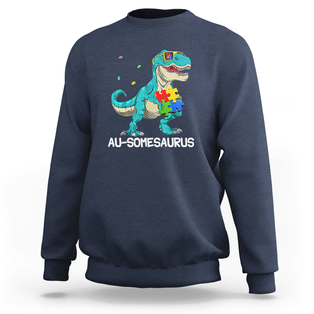 Dinosaur autism sweatshirt, navy, turquoise dino puzzle graphic with AU-somesaurus text