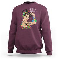 Women's autism mom sweatshirt, maroon with illustrated puzzle heart graphic