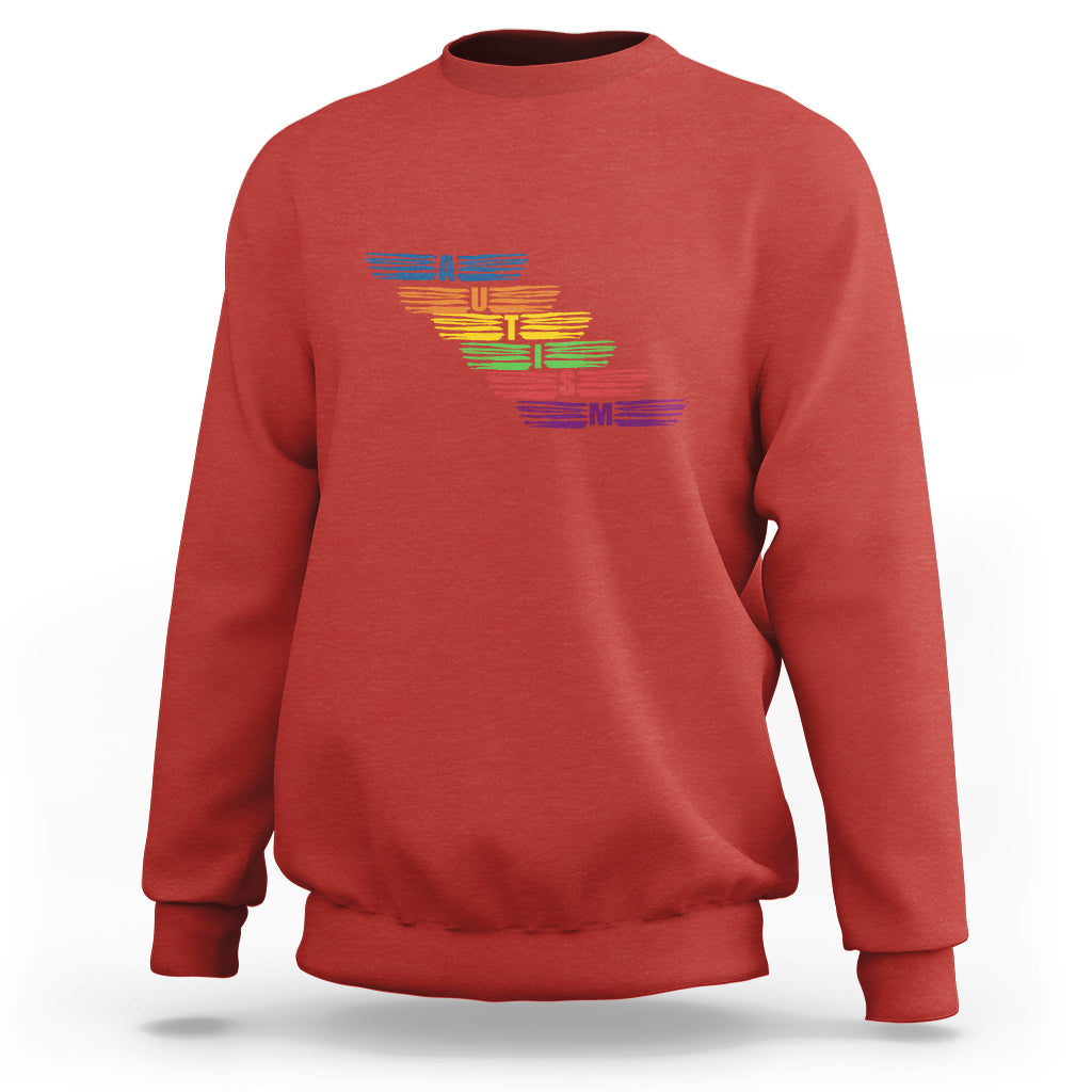 Red crewneck sweatshirt with multicolor autism awareness typography graphic