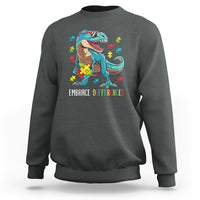 Charcoal sweatshirt with dinosaur puzzle heart graphic and "Embrace Differences" print
