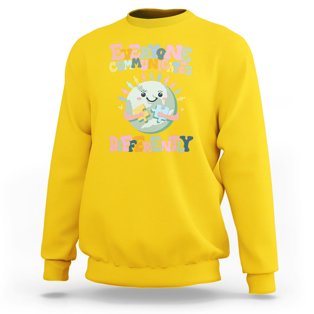Yellow crewneck sweatshirt with autism acceptance graphic, long sleeves