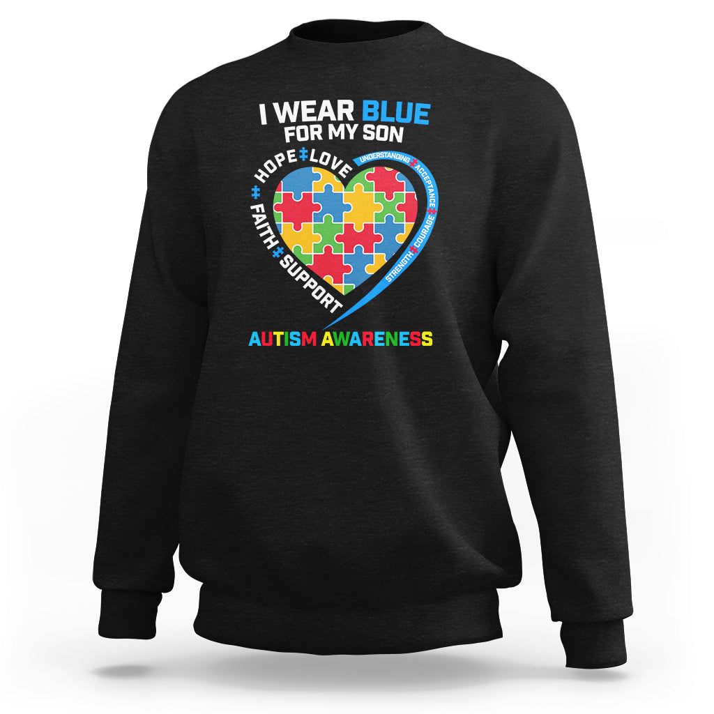 Black autism awareness sweatshirt with heart puzzle graphic and 'I wear blue for my son'