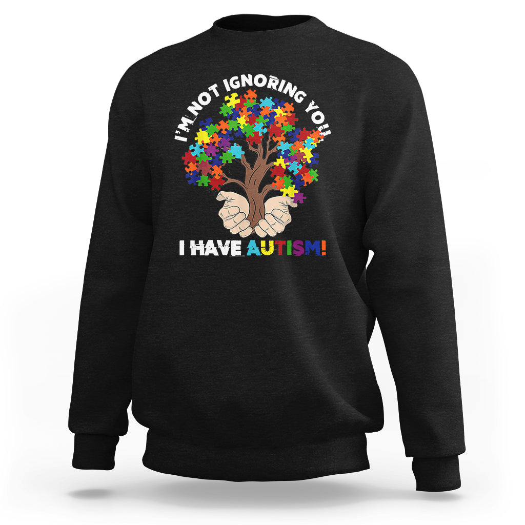 Black crewneck sweatshirt with autism puzzle tree graphic and slogan 'I HAVE AUTISM!'