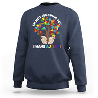 Navy crewneck sweatshirt with autism puzzle tree graphic and slogan 'I HAVE AUTISM!'