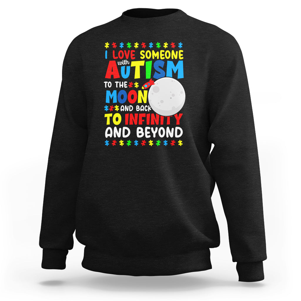 Black crewneck sweatshirt with colorful autism moon-and-stars front graphic