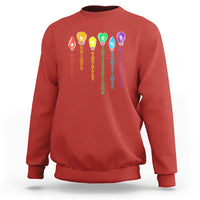 Red crewneck sweatshirt with colorful award and text graphic on front.