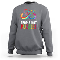Charcoal crewneck sweatshirt with “People Not Puzzles” rainbow infinity graphic