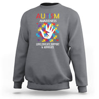 Autism awareness sweatshirt, heather gray crewneck with colorful puzzle-hand graphic and text