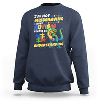 Navy dinosaur autism sweatshirt with colorful front text and dinosaur graphic