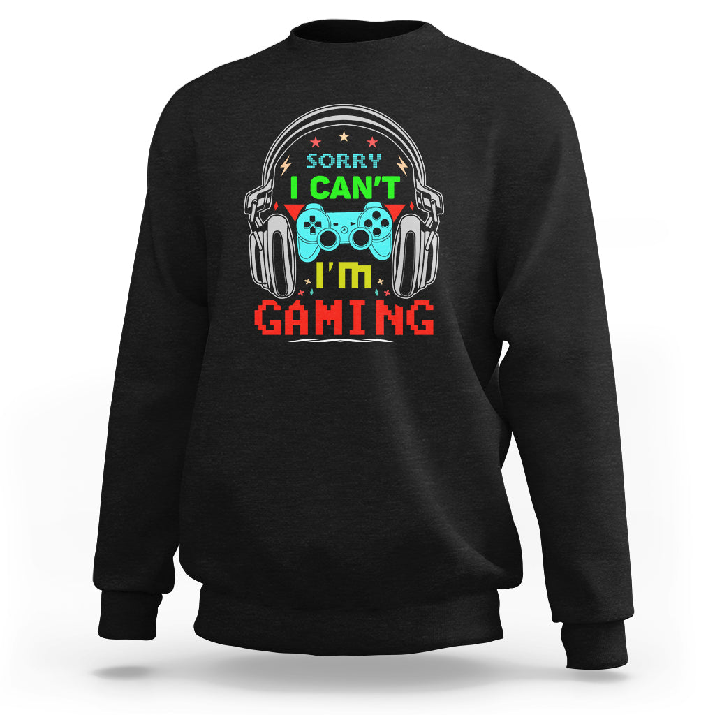 Black sweatshirt with 'Sorry I can't I'm gaming' headset gamepad graphic