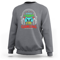 Charcoal gray sweatshirt with 'Sorry I can't I'm gaming' headset gamepad print