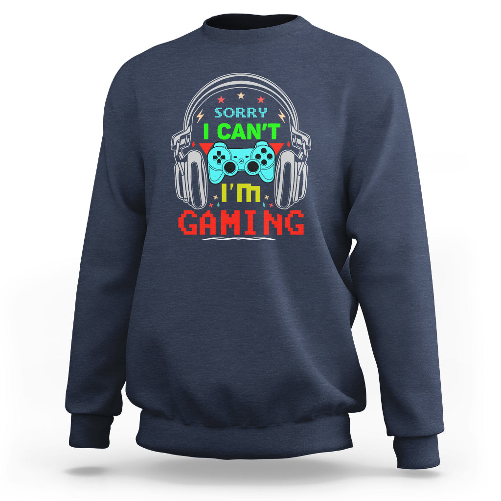 Navy sweatshirt with 'Sorry I can't I'm gaming' headset and gamepad graphic
