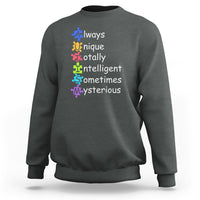 Autism definition sweatshirt, charcoal gray crewneck with colorful text and puzzle icons