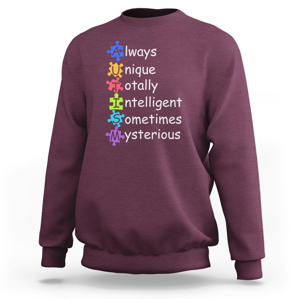 Autism definition sweatshirt, maroon crewneck with colorful text and puzzle icons