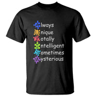 Black autism definition graphic T-shirt with rainbow text and puzzle-piece figures