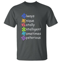 Dark charcoal autism definition graphic T-shirt with rainbow text and puzzle-piece figures
