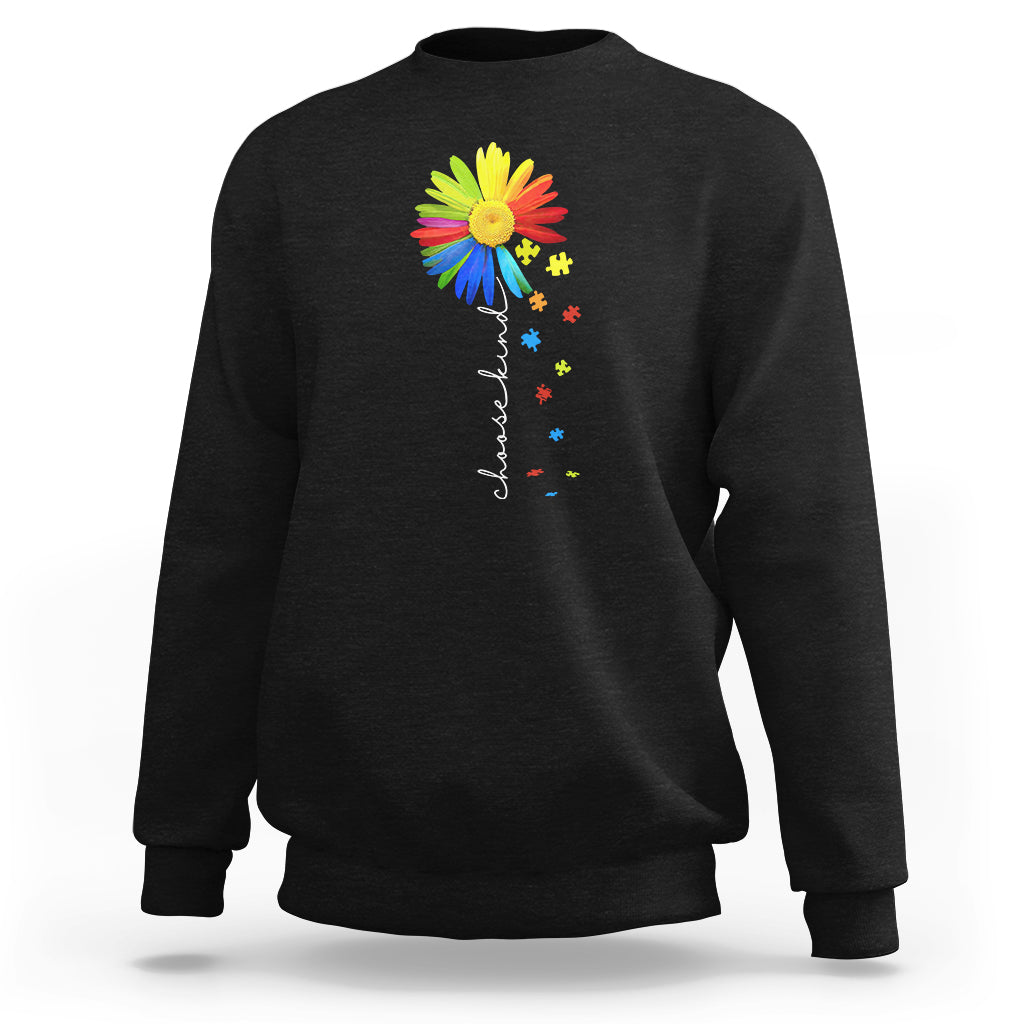 Black crewneck sweatshirt with colorful sunflower and rainbow puzzle graphic on chest