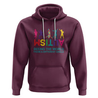 Maroon autism hoodie with colorful silhouettes and 'Seeing the world' text on front