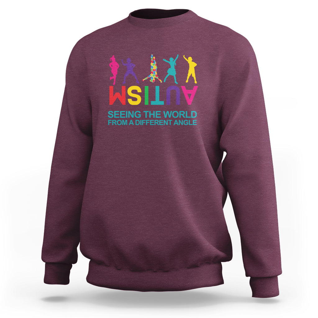 Autism sweatshirt, maroon, colorful world-text graphic on chest