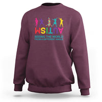 Autism sweatshirt, maroon, colorful world-text graphic on chest