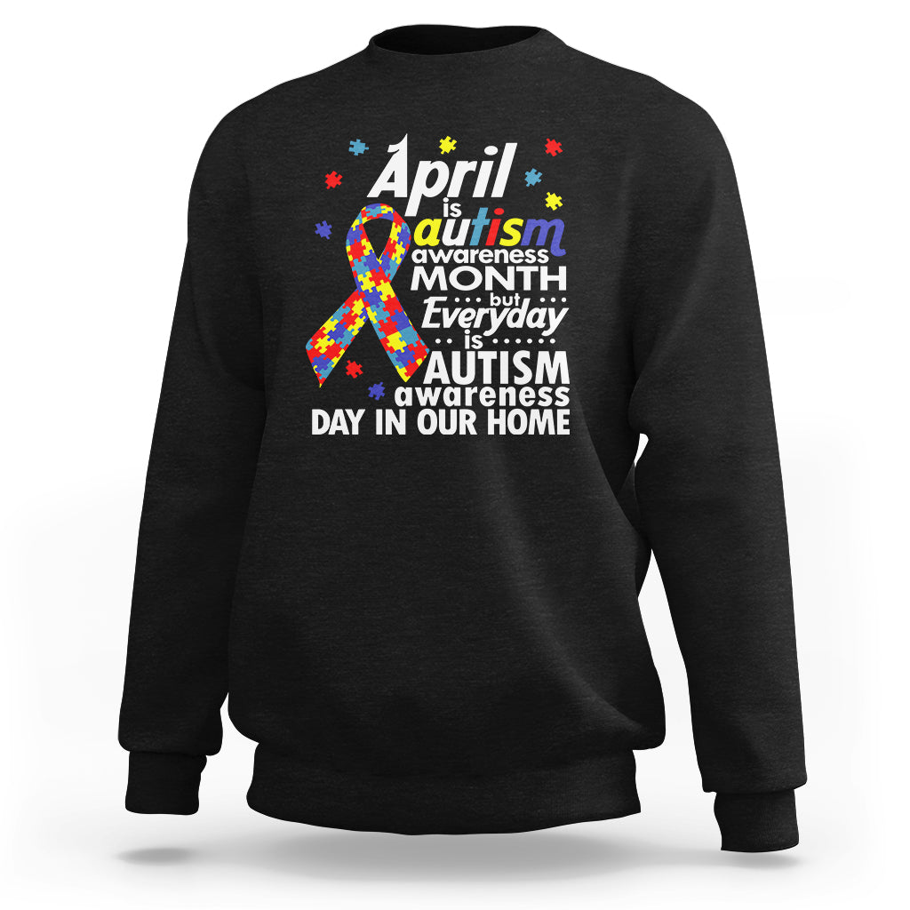 Black crewneck sweatshirt, back graphic for Autism Awareness Month and April.