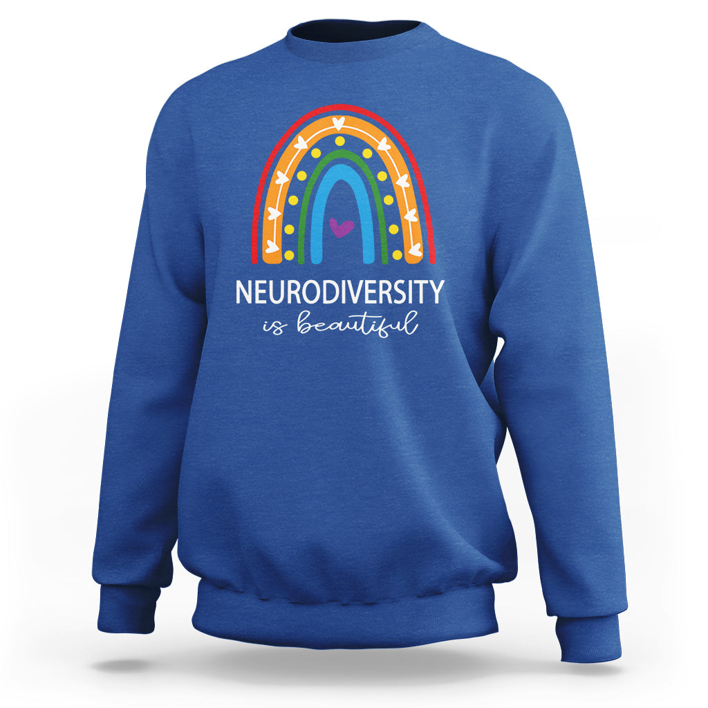 Royal blue crewneck sweatshirt with rainbow arch and 'NEURODIVERSITY is beautiful' text