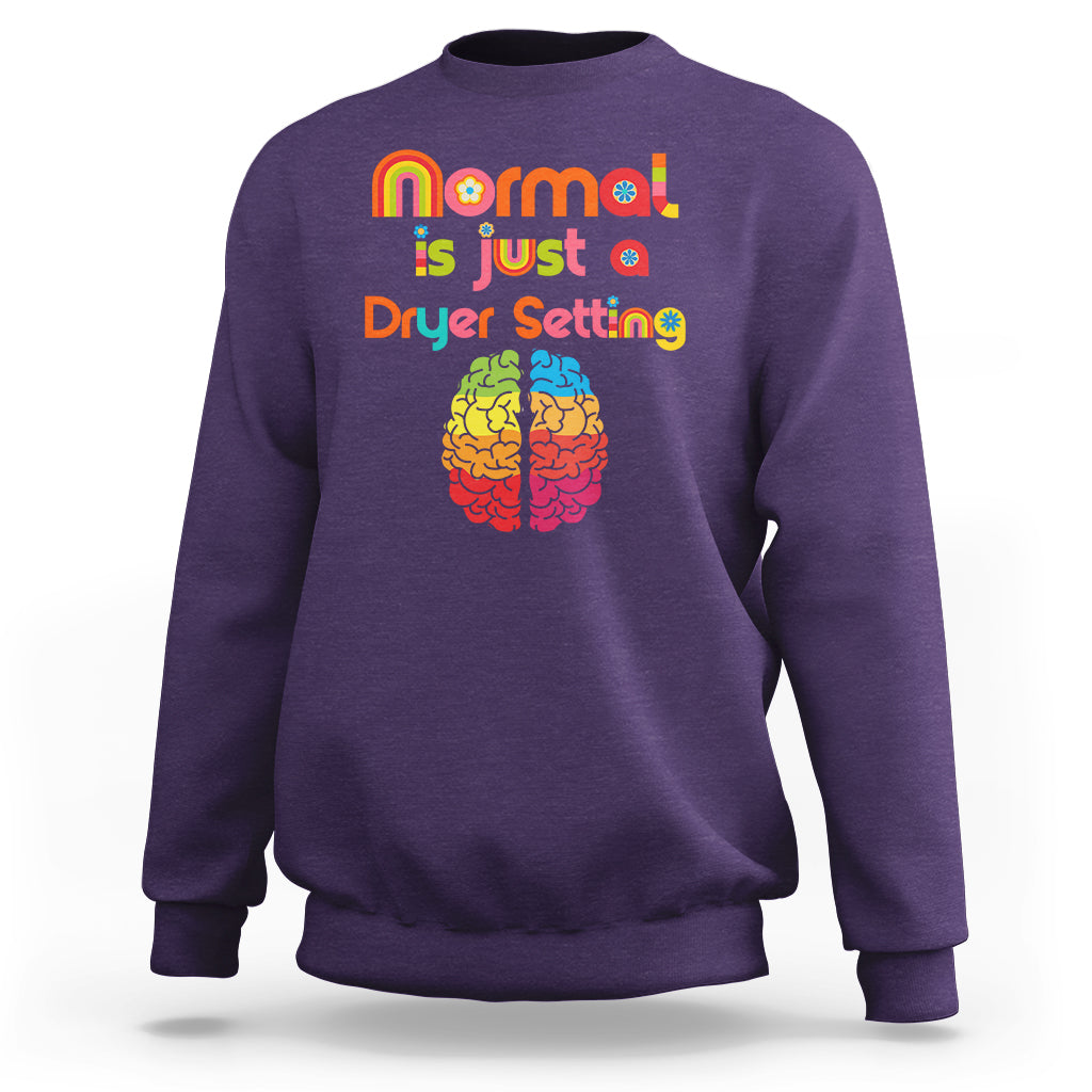 Purple autism sweatshirt with rainbow text 'normal is just a Dryer Setting' and brain graphic