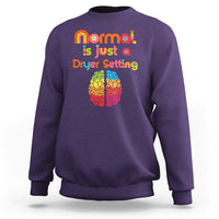 Purple autism sweatshirt with rainbow text 'normal is just a Dryer Setting' and brain graphic