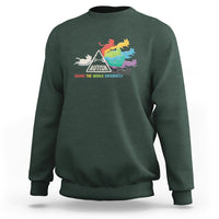 Crewneck sweatshirt in dark forest green with colorful cat autism graphic on front