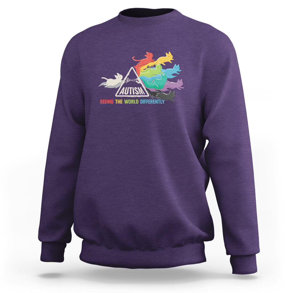 Crewneck sweatshirt in purple with colorful cat autism graphic on front