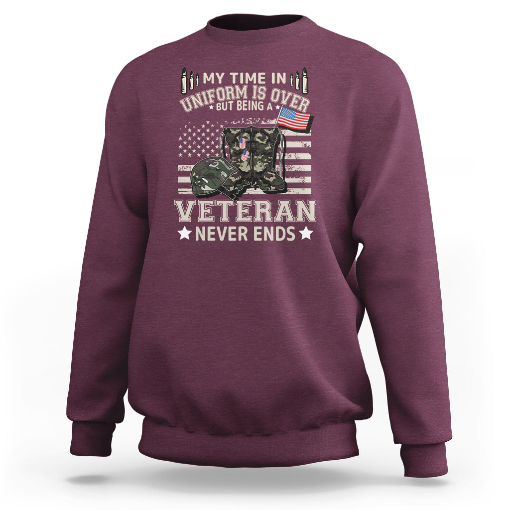 Maroon sweatshirt with Veteran Never Ends graphic on front