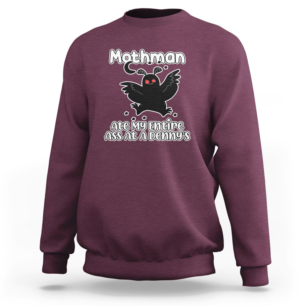 Maroon sweatshirt with Mothman graphic, 'Ate my entire ass at a Denny's' print