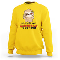 Daisy yellow sweatshirt with cartoon sloth face and bold slogan graphic, crewneck pullover