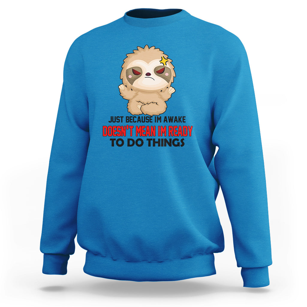 Sapphire blue sweatshirt with cartoon sloth face and bold slogan graphic, crewneck pullover