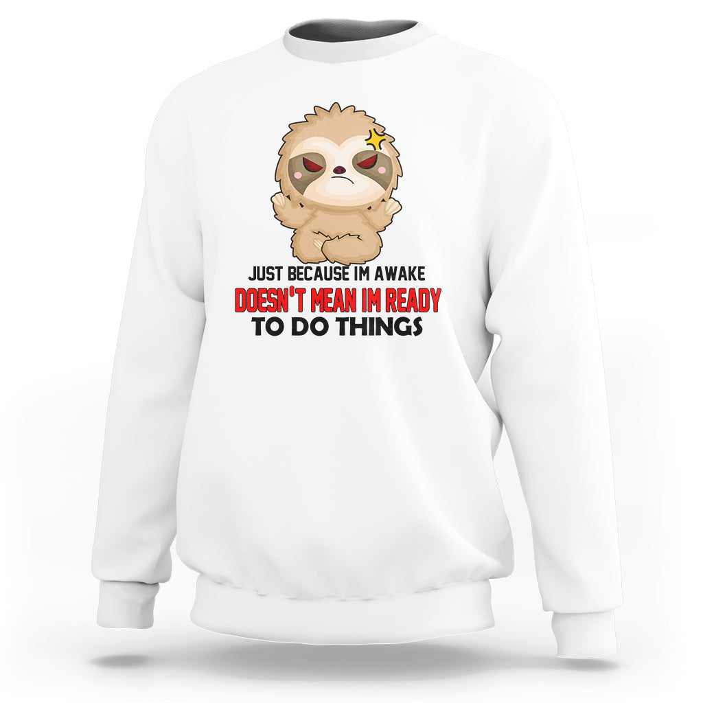 White sweatshirt with cartoon sloth face and bold slogan graphic, crewneck pullover