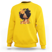 Yellow crewneck sweatshirt with front portrait graphic and floral wreath