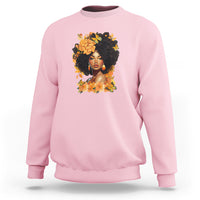 Light pink crewneck sweatshirt with front portrait graphic and floral wreath