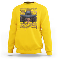 Ladies Juneteenth sweatshirt in daisy yellow with colorful portrait graphic and text on front