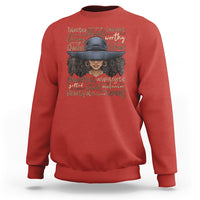 Ladies Juneteenth sweatshirt in red with colorful portrait graphic and text on front