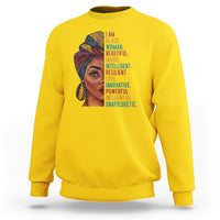 Yellow crewneck sweatshirt with woman face graphic and vertical inspirational text.