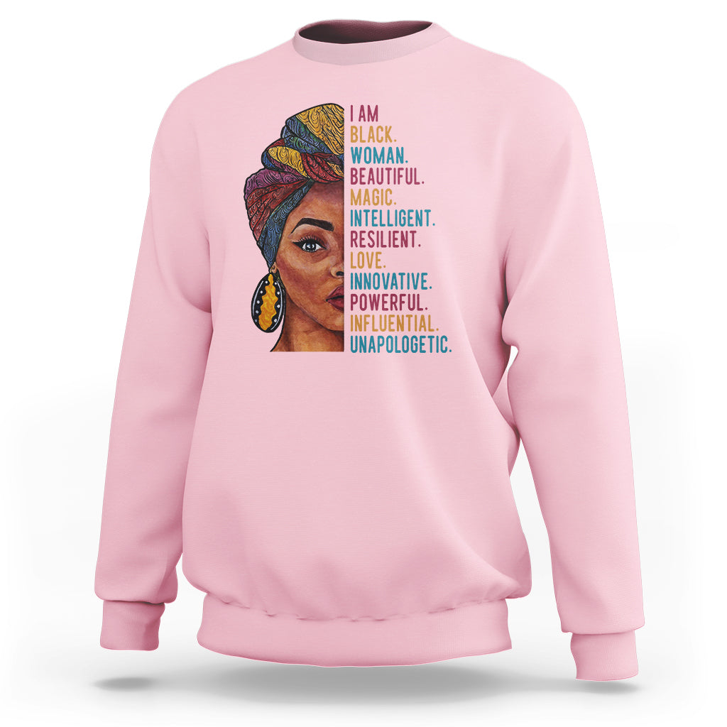 Light pink crewneck sweatshirt with woman face graphic and vertical inspirational text.