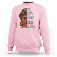 Light pink crewneck sweatshirt with woman face graphic and vertical inspirational text.